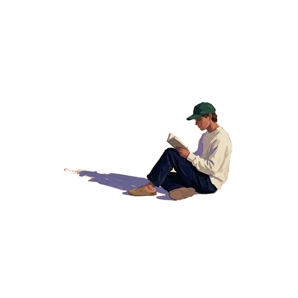 Sitting reading in a cap